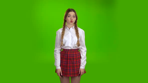 Student Shows a Gesture More Quietly . Green Screen