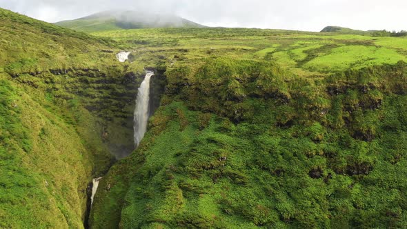 Aerial view of a waterfall on Flores Island, Azores, Portugal.