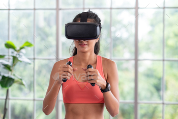 boxing with joystick control at home,Future technology for fitness lifestyle concept.