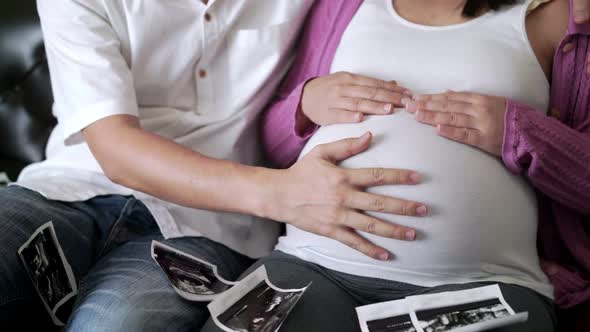 Pregnant Couple Feels Love and Relax at Home