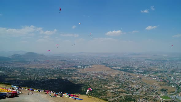 Paragliding Festival Crowds In City Landscape