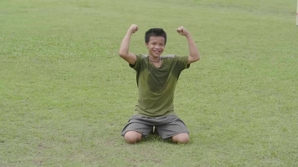 Boy Celebrating A Goal alt