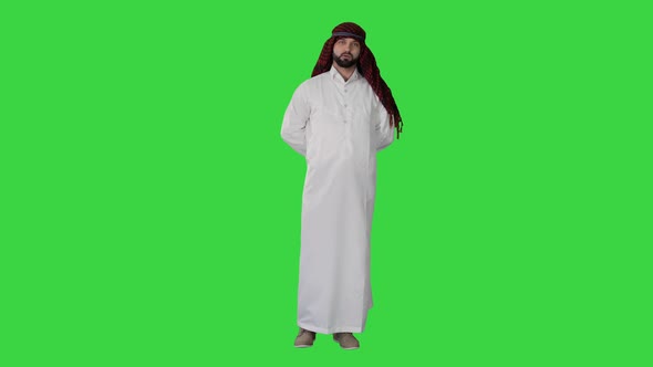 Sheikh Standing and Telling a Story on a Green Screen, Chroma Key