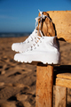 White sneakers on the beach - PhotoDune Item for Sale