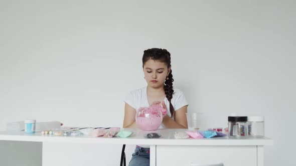 Charming Young Lady Streches Her Slime