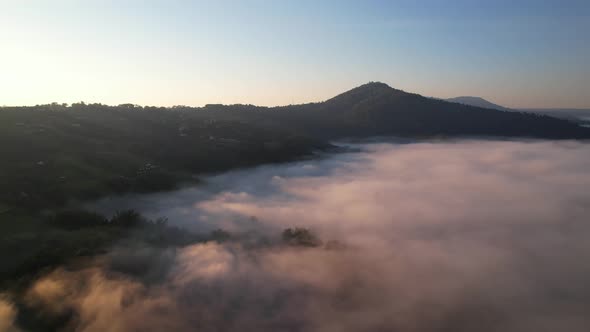 4K Aerial view of Mountains landscape with morning fog.