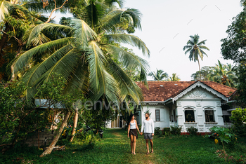 a house. A couple in love travels. Man and woman in Asia. Loving couple. Newly married couple. Wedding travel