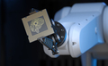 Robotic Arm Holding an Artificial Intelligence Computer Processor Unit - PhotoDune Item for Sale