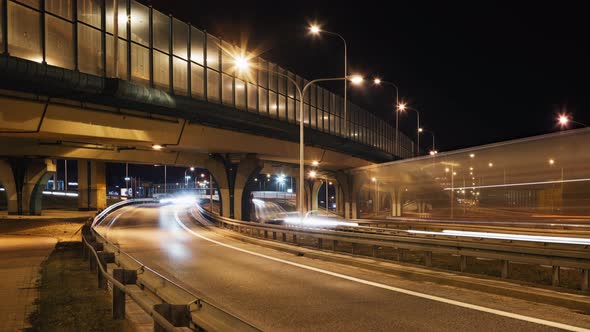 Timelapse Car Traffic Road Junction Highway in Big City at Night