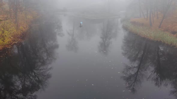 Fog Over the Lake in the Autumn Park