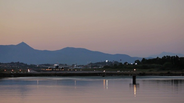 Take-off of Airplane in Corfu Airport at Night