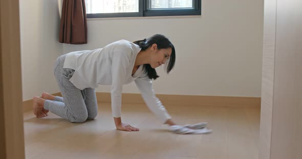 Woman cleaning the ground for spring clean