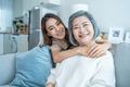 Portrait of Asian lovely family, young daughter hugging older mother. - PhotoDune Item for Sale