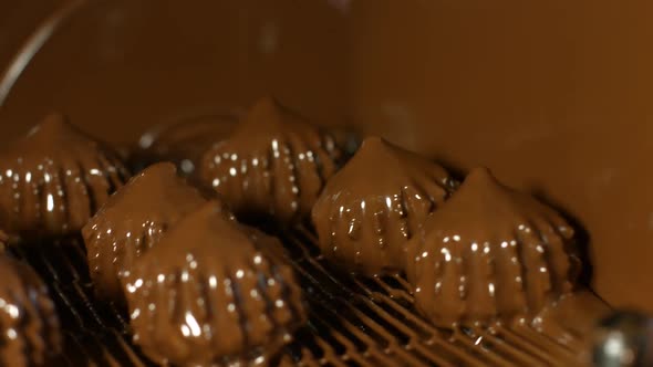 Dark Candies on Conveyor.