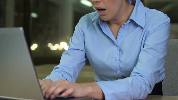 Female Workaholic Yawning Typing Laptop Keyboard, Working Late Night, Deadline