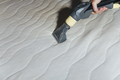 cleaning the mattress with a vacuum cleaner - PhotoDune Item for Sale