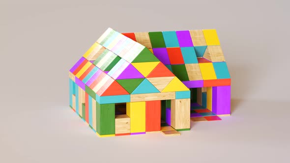 Colorful house made out of wooden blocks. Preschool building game. Education.