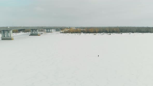 Boundless White Frozen River Surface Covered with Snow