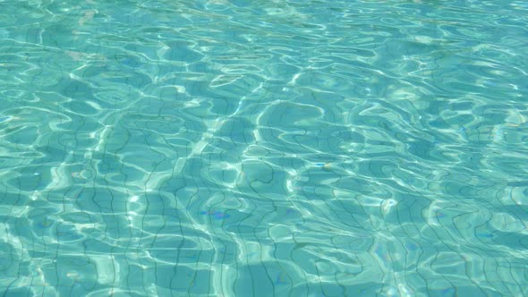 Abstract pool water crystal clear with sunlight reflect alt