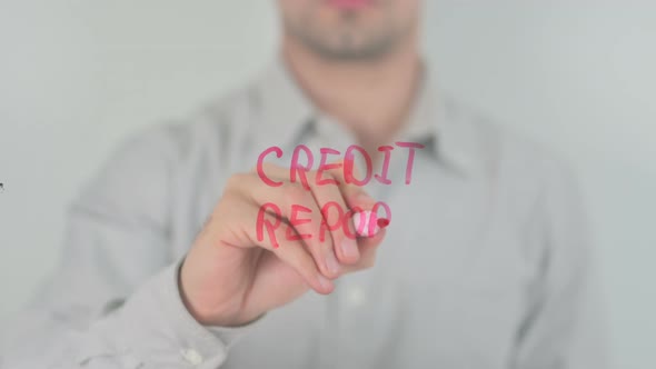 Credit Report Writing on Screen with Hand