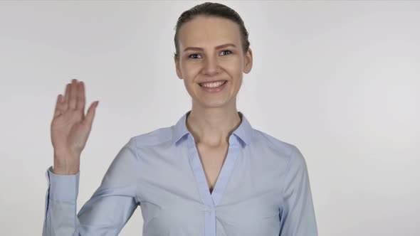 Young Businesswoman Waving Hand To Welcome