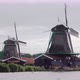 Two Dutch Windmills on the Bank of the Canal - VideoHive Item for Sale