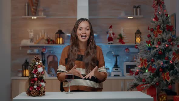 Merry Young Adult Enjoying Christmas Conversation