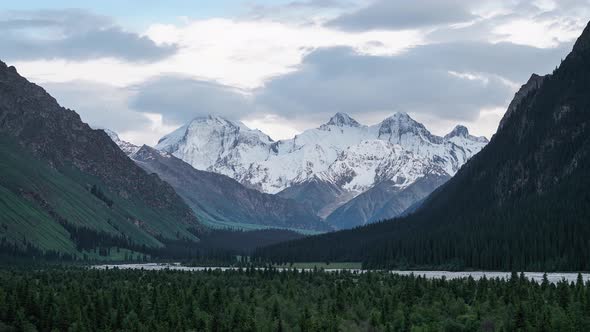 Snow mountain and flowing cloud