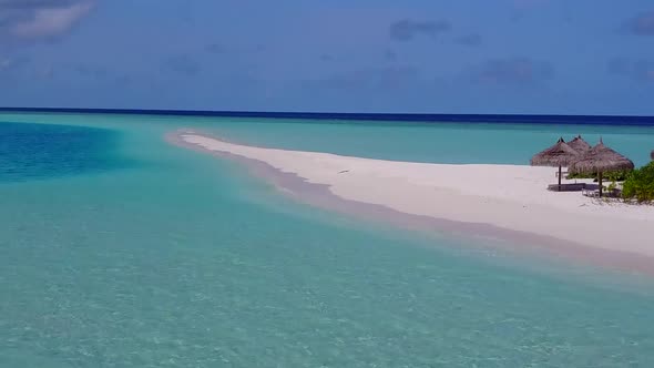 Aerial travel of island beach by blue lagoon and sand background