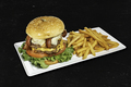 Double burger with french fries on black background - PhotoDune Item for Sale