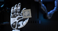 Robot's Hand Holding an Artificial Intelligence Computer Processor Unit - PhotoDune Item for Sale