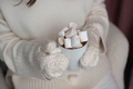 Woman holding a cup with cocoa and marshmallow - PhotoDune Item for Sale