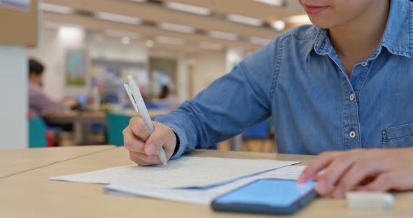 Woman study at library