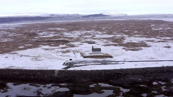 Secluded Church in Snowy Iceland on the Coast