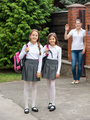 Cute smiling girls leaving home for school at morning - PhotoDune Item for Sale