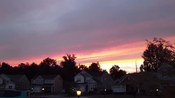 Neighborhood to sky drone shot at sunset