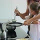 Mother and Daughter Cooking in Kitchen - VideoHive Item for Sale