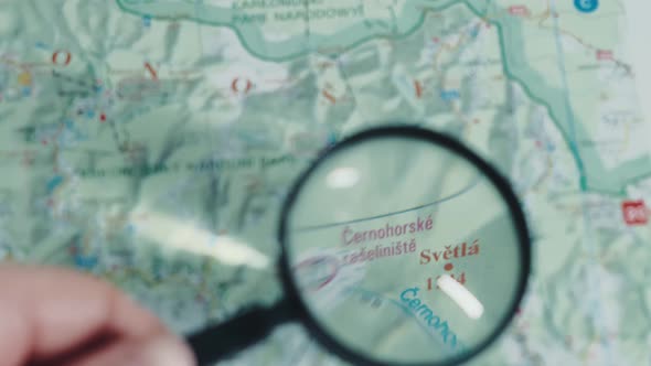 A Close Up of the Magnifying Glass Used to Look at the Map