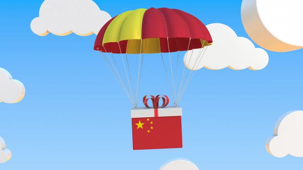 Box with National Flag of China Falls with a Parachute