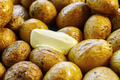 Roasted unpeeled baby potatoes with butter - PhotoDune Item for Sale