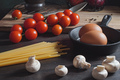 Kitchen table with spaghetti, tomatoes, mushrooms and eggs - PhotoDune Item for Sale