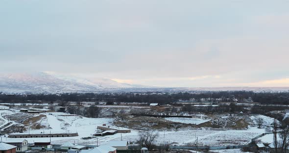 Aerial View of Gray with Houses and Trees in Winter