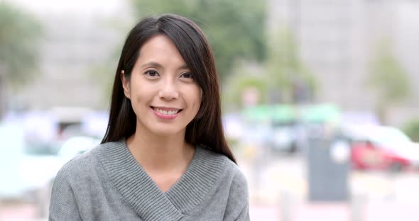 Asian woman smiling