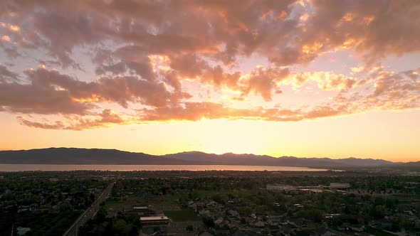 Hyperlapse of sunset flying over city neighborhood