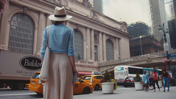 Attractive girl with a retro camera, NYC