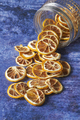 Dried Orange Slices Falling Inside From a Jar - PhotoDune Item for Sale