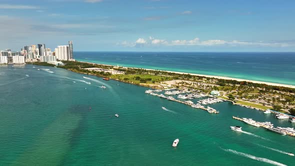 Aerial push in Miami Beach Haulover Park 4k 60p