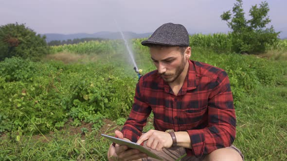 Farmer using tablet.