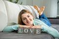 cute woman posing with decorative word "Love" - PhotoDune Item for Sale