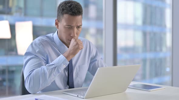 Sick African American Businessman Having Coughing in Office